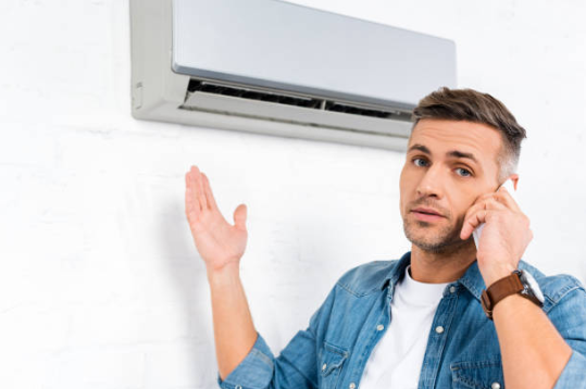 Customer calling Green Energy Mechanical in Canton, MA for an AC technician to service a wall mounted air conditioner.